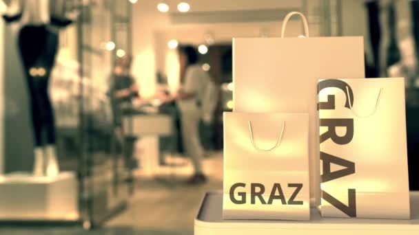 Borse con testo Graz. Shopping in Austria relativo concettuale animazione 3D — Video Stock