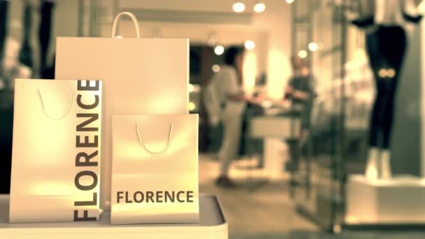 用弗洛伦斯的文字买购物袋。 在意大利购物相关概念3D动画 — 图库视频影像