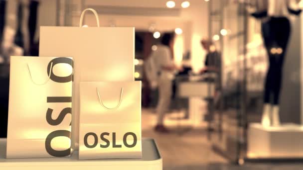 Bolsas de compras con texto de Oslo. Compras en Noruega animación 3D conceptual relacionada — Vídeo de stock