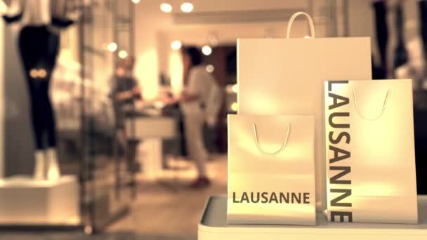 Bolsas de compras con texto de Lausana. Compras en Suiza animación 3D conceptual relacionada — Vídeo de stock