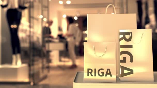 Borse della spesa con testo Riga. Shopping in Lettonia animazione 3D correlata — Video Stock