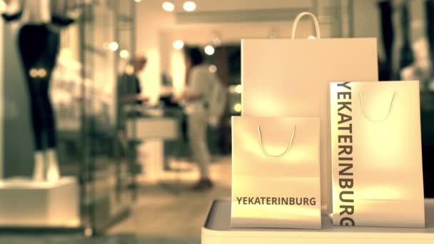 Bags with Yekaterinburg text. Shopping in Russia related 3D animation — ストック動画