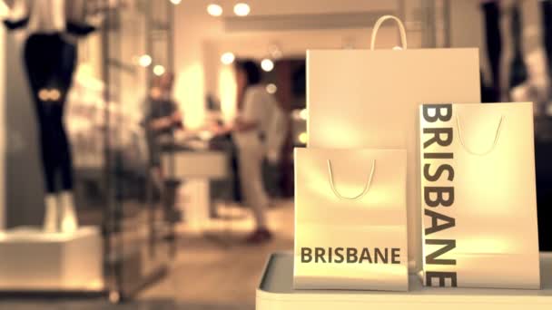 Sacchetti di carta con testo Brisbane. Shopping in Australia animazione 3D correlata — Video Stock