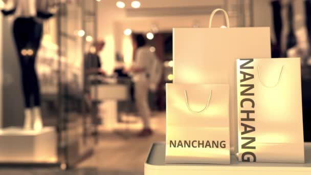 Tassen met Nanchang tekst. Winkelen in China gerelateerde conceptuele 3D-animatie — Stockvideo