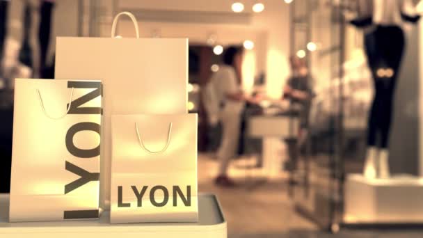 Sacos com texto Lyon. Compras na França relacionados com animação 3D — Vídeo de Stock