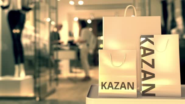 Bolsas de compras con texto kazan. Compras en Rusia animación 3D relacionada — Vídeos de Stock