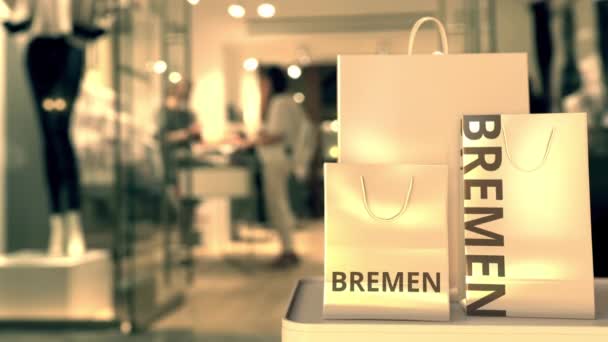 Sacchetti di carta con testo Brema. Shopping in Germania relativi all'animazione concettuale 3D — Video Stock
