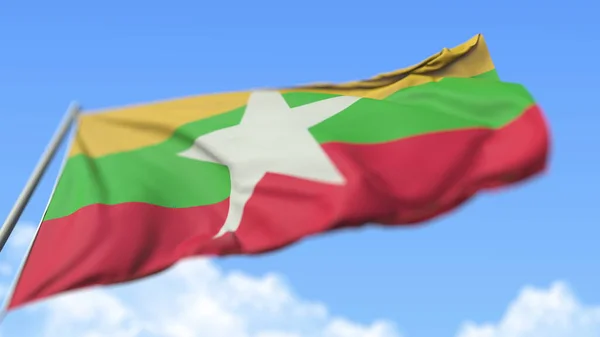 Macha flagą narodową Związku Myanmar, widok z niskiego kąta. 3d renderowanie — Zdjęcie stockowe