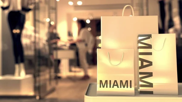 带有迈阿密说明的购物袋挡住了模糊的商店入口。 在美国购物相关概念3D渲染 — 图库照片