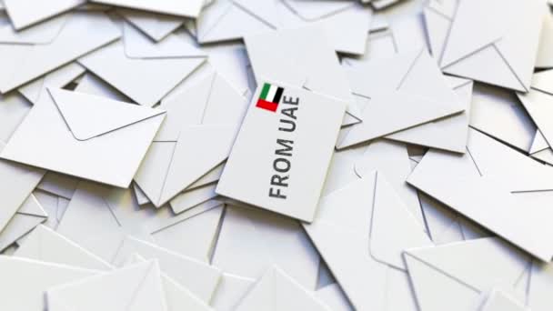 信封内贴有阿拉伯联合酋长国的Uae邮票和其他信封。 国际邮件相关概念3D动画 — 图库视频影像