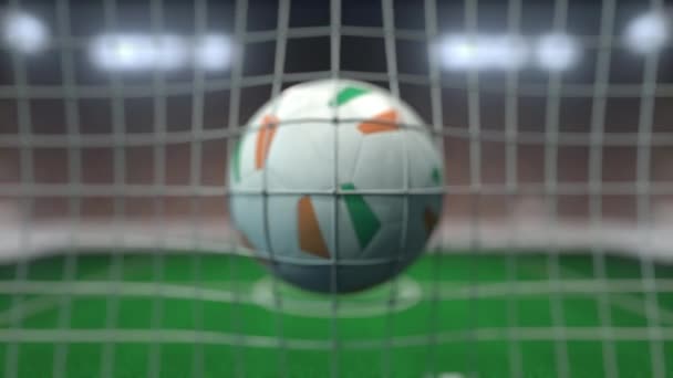 Futebol com bandeiras da República da Irlanda atinge gol líquido. Animação 3D em câmera lenta — Vídeo de Stock