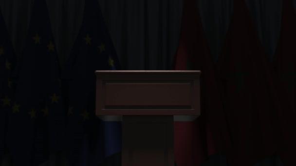 Banderas de la UE y Marruecos y tribuna oradora del podio. Evento político o negociaciones relacionadas con la animación conceptual 3D — Vídeo de stock