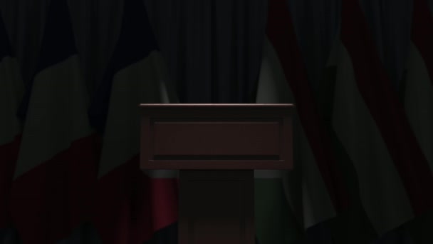 Bendera Prancis dan Hungaria dan speaker podium tribune. Acara politik atau negosiasi terkait animasi 3D konseptual — Stok Video