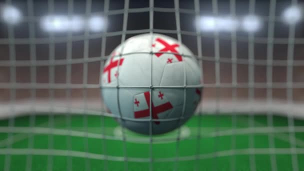 Calcio con bandiere della Georgia colpisce rete gol. Animazione 3D al rallentatore — Video Stock