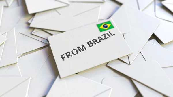 Envelope with From Brazil text on pile of other envelopes. International mail related conceptual 3D rendering — Stock Photo, Image