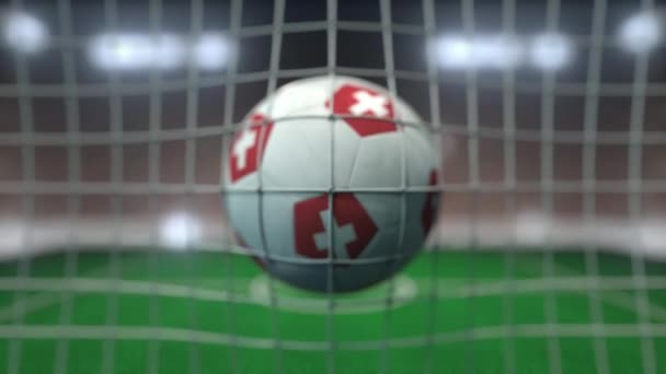 Bulanık stadyuma karşı İsviçre bayraklı futbol. Kavramsal 3d canlandırması — Stok video