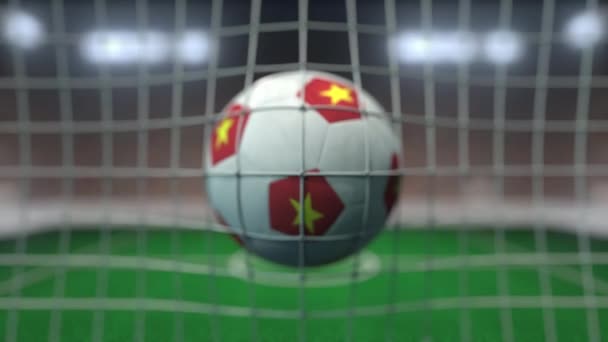 Football avec des drapeaux du Vietnam frappe filet de but. Animation 3D au ralenti — Video