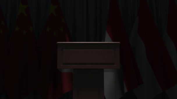 중국 과 인도네시아의 국기 이 자 연설자인 트리뷴입니다. 정치적 이벤트나 협상은 개념적 3D 애니메이션 과 관련 이 있습니다. — 비디오