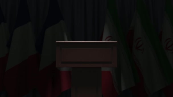 Fransa ve İran bayrakları ve hoparlör tribünü. Siyasi olay veya müzakerelerle ilgili kavramsal 3D animasyon — Stok video