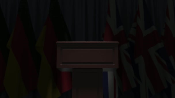 Flags of Germany and the United Kingdom and speaker podium tribune. Political event or negotiations related conceptual 3D animation — Stock Video