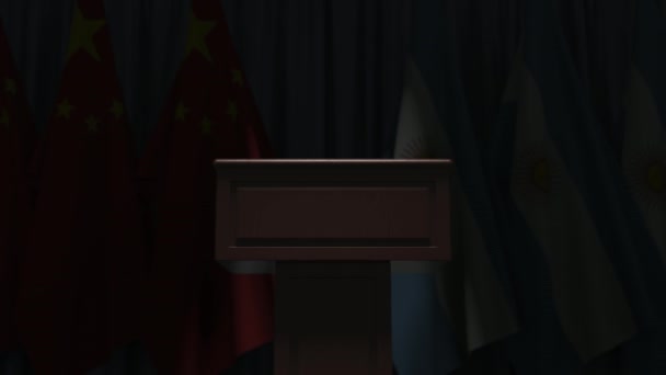 Drapeaux de Chine et d'Argentine et tribune du podium des orateurs. Evénement politique ou négociations liées à l'animation 3D conceptuelle — Video