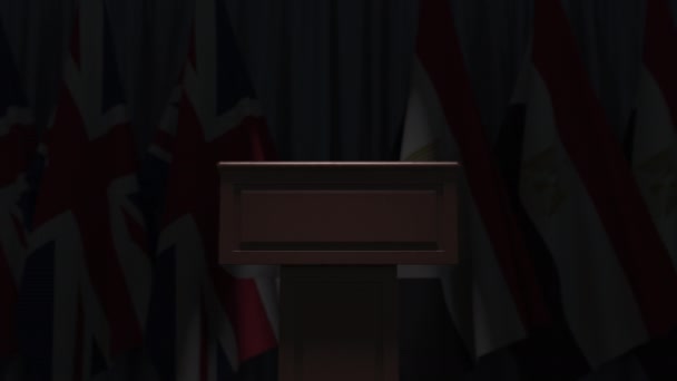 Bandeiras do Egito e do Reino Unido e tribuno, animação 3D — Vídeo de Stock