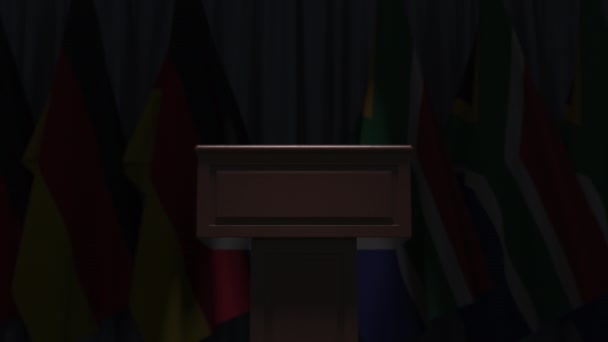 Rangée de drapeaux d'Afrique du Sud et d'Allemagne et tribune haut-parleur, animation 3D conceptuelle — Video