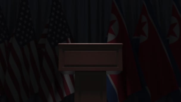 Veel vlaggen van Noord-Korea en de Usa achter tribune, 3D-animatie — Stockvideo