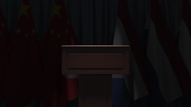Флаги Нидерландов и Китая и трибуны, 3D анимация — стоковое видео
