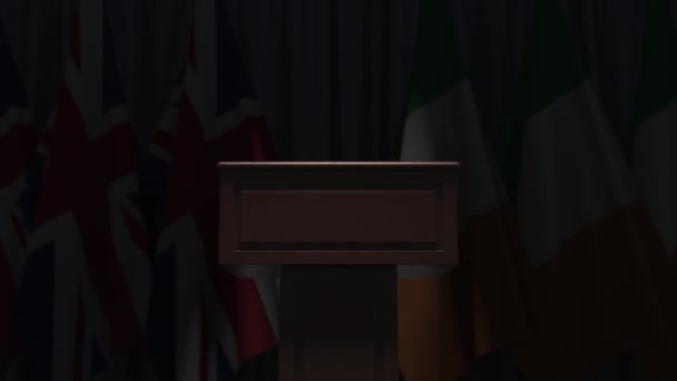 Flags of Ireland and the United Kingdom at international meeting, 3D animation — Stock Video