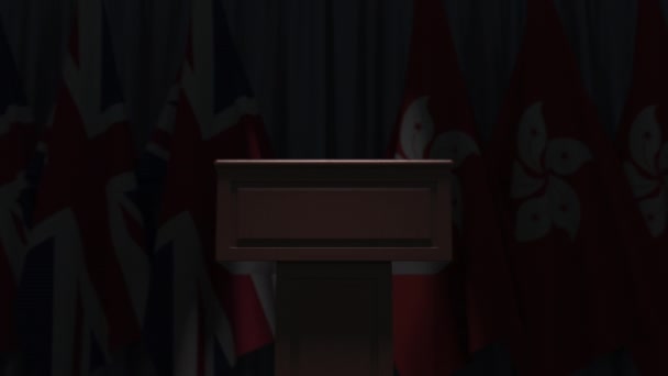 Hong Kong ve Birleşik Krallık bayrakları ve konuşmacı tribünü, kavramsal 3D animasyon — Stok video