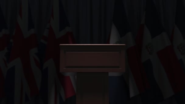 Uluslararası toplantıda Dominik Cumhuriyeti ve Birleşik Krallık bayrakları, 3D animasyon — Stok video