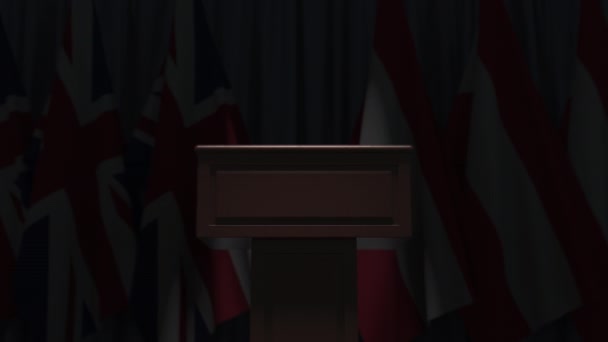Many flags of Austria and the United Kingdom behind speaker tribune, 3D animation — Stock Video