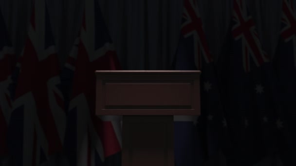 Flags of Australia and the United Kingdom at international meeting, 3D animation — Stock Video