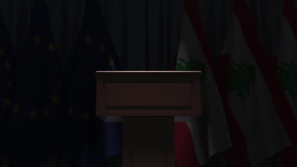 Veel vlaggen van Libanon en de EU achter spreker tribune, 3D-animatie — Stockvideo