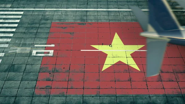 Aerial view of a landing airplane revealing flag of Vietnam on the airfield of an airport. Air travel related conceptual 3D rendering — Stock Photo, Image