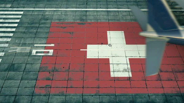空港の飛行場でスイスの旗を明らかに着陸機の空中ビュー。航空旅行関連の概念3Dレンダリング — ストック写真