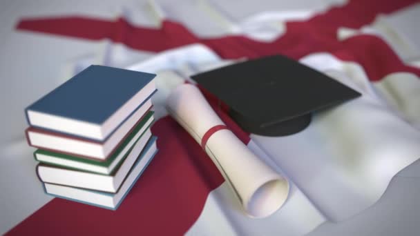 Examenshatt, böcker och diplom på Alabamas flagga. Högre utbildning i den USA relaterade konceptuella 3D-animation — Stockvideo