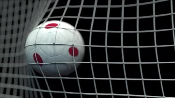 Ball with flags of Japan hits goal. 3D animation — Stock Video