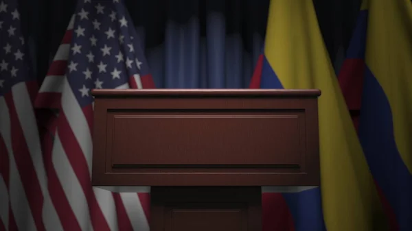 Flaggen von Kolumbien und den USA und Tribüne, 3D-Darstellung — Stockfoto