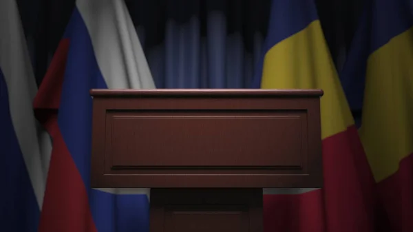Флаги Румынии и России на международной встрече, 3D рендеринг — стоковое фото