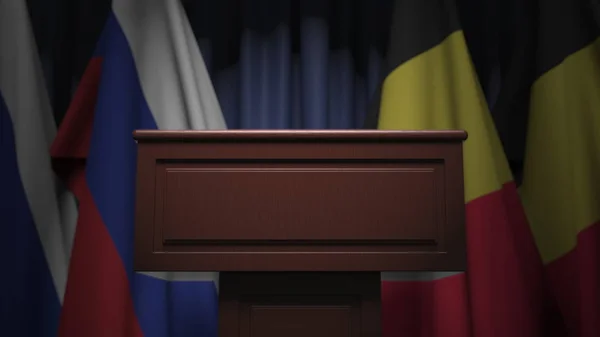 Bandiere di Belgio e Russia e tribune, rendering 3D — Foto Stock