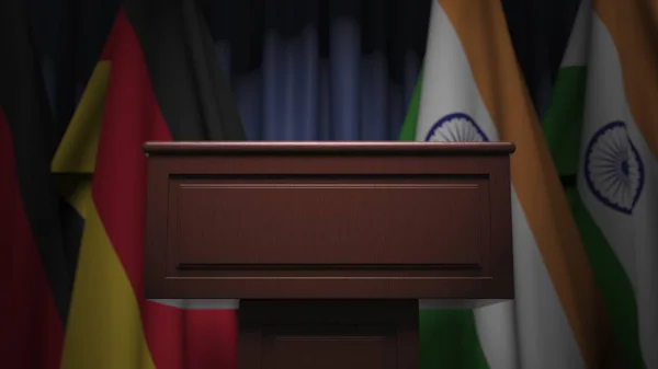 Fila de bandeiras da Índia e da Alemanha e tribuno orador, renderização 3D conceitual — Fotografia de Stock