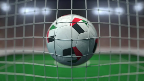 Football avec des drapeaux des Émirats arabes unis Émirats arabes unis en filet contre le stade flou. rendu 3D conceptuel — Photo