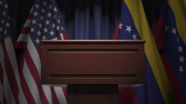 Muchas banderas de Venezuela y los EE.UU. detrás de tribuna altavoz, representación 3D —  Fotos de Stock