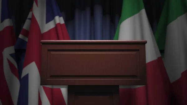 Uluslararası toplantıda İtalya ve Birleşik Krallık bayrakları, 3d render — Stok fotoğraf