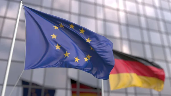 Ondeando banderas de la Unión Europea UE y Alemania frente a una moderna fachada de rascacielos. Renderizado 3D — Foto de Stock