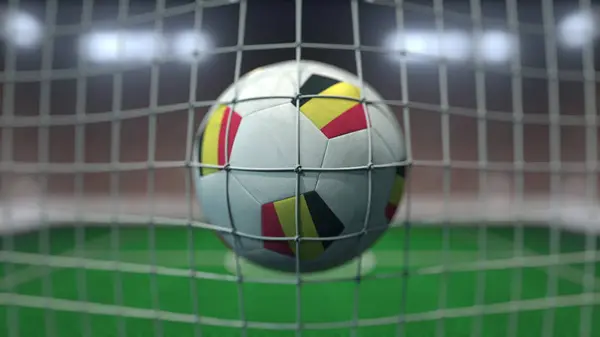 Futebol com bandeiras da Bélgica atinge gol líquido. Renderização 3D — Fotografia de Stock