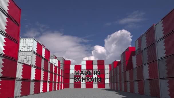 Many cargo containers with MADE IN BAHRAIN text and national flags. Bahraini import or export related 3D animation — ストック動画