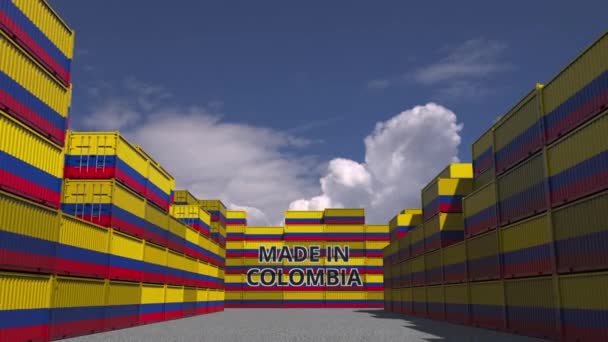 Many cargo containers with MADE IN COLOMBIA text and national flags. Colombian import or export related 3D animation — ストック動画